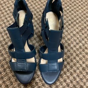 Very cute navy blue open cut leather zip up back shoes
